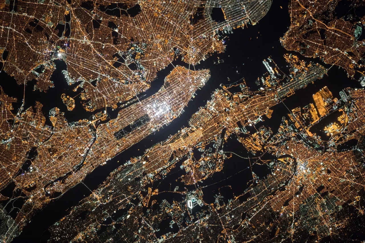 Aerial view of illuminated cityscape